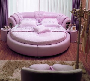 Round-Bed-Exquisite-pink-round-shape-bed-decor-with-two-pink-bedside-tables-and-attractive-look-headboard-design-Enchanting-Round-Beds-for-classy-bedrooms